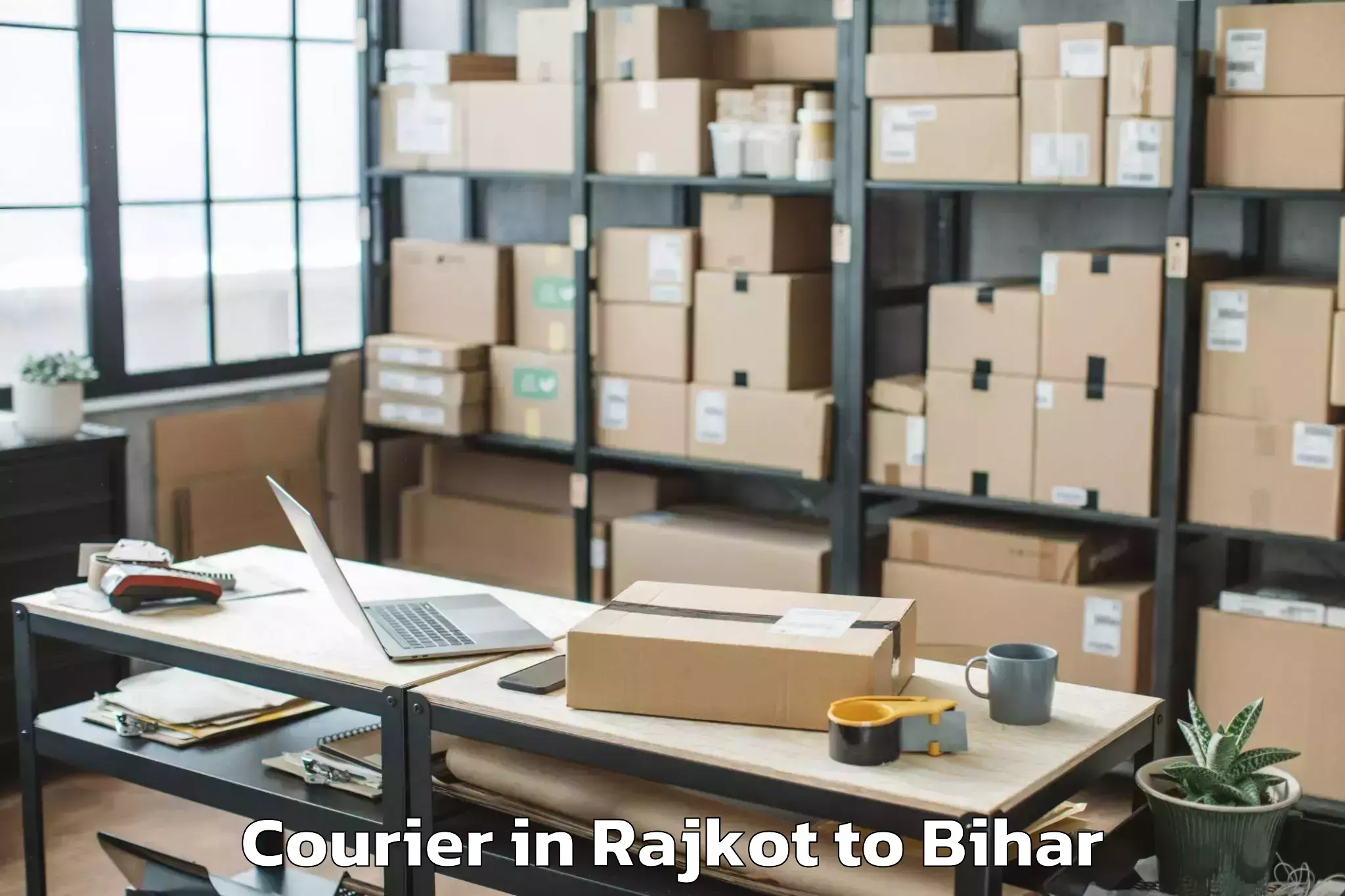 Trusted Rajkot to Akorhi Gola Courier